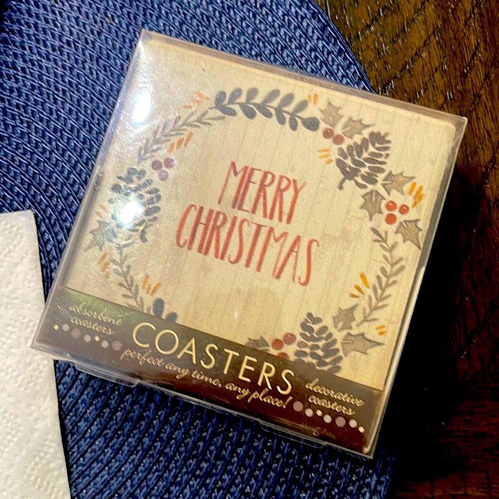 4 pieces ceramic Christmas coasters! Unused at all found this in my store room !
